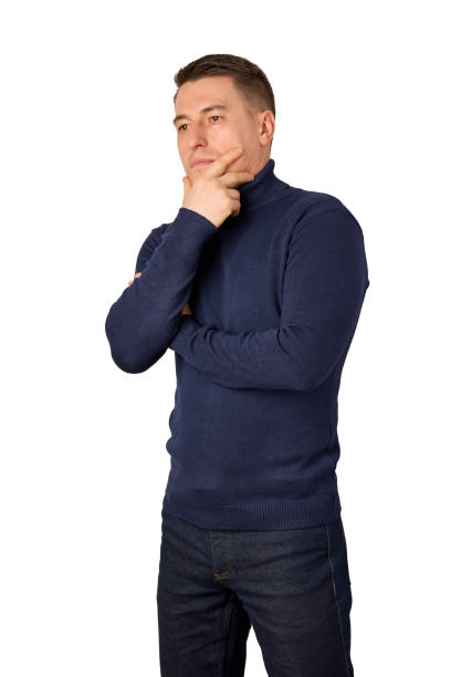 istock Young man wearing blue turtleneck sweater and jeans 1455957278
