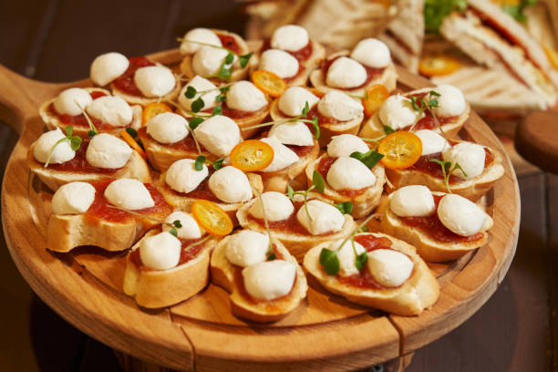 istock appetizing sandwiches with mozzarella and tomato paste on a white baguette. snack. buffet. antipasti. breakfast. snack 1455961396