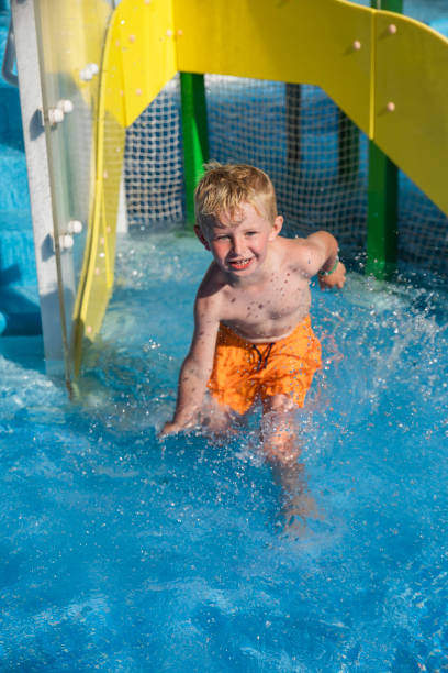 istock Splashing in the Swimming Pool 1455962046