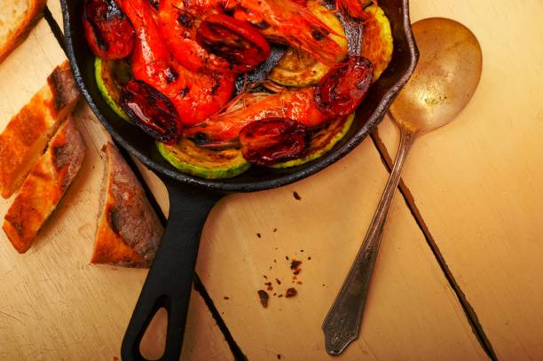 istock roasted shrimps with zucchini and tomatoes 1455962288