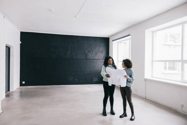 istock Female small business owners, looking at potential new office space. 1455963465