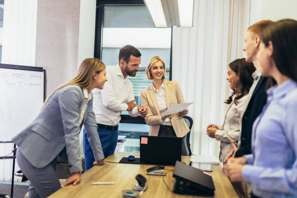 istock Office colleagues having discussion during meeting in conference room. 1455964880