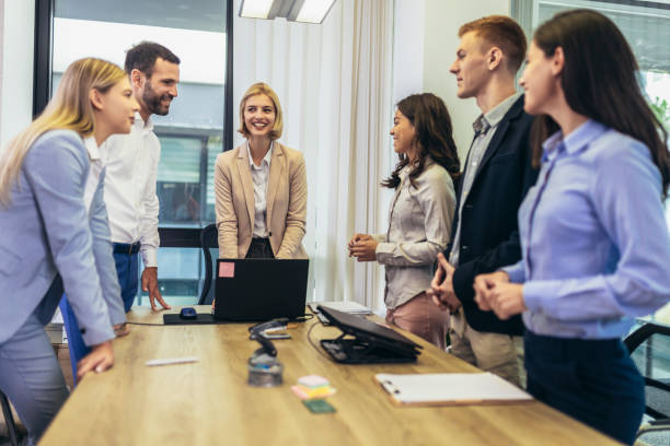 istock Office colleagues having discussion during meeting in conference room. 1455964911