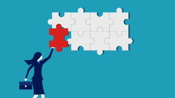 istock Completed the last task. Businesswoman completing the last jigsaw puzzle 1455966489