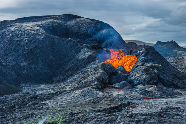 istock Volcanic eruption with some lava flow 1455966752