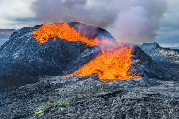 istock strong lava flow from a volcanic crater 1455967573