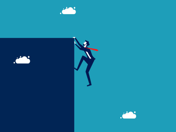 istock Businessman climbing a steep cliff. symbol of opportunity for advancement and challenges 1455968180