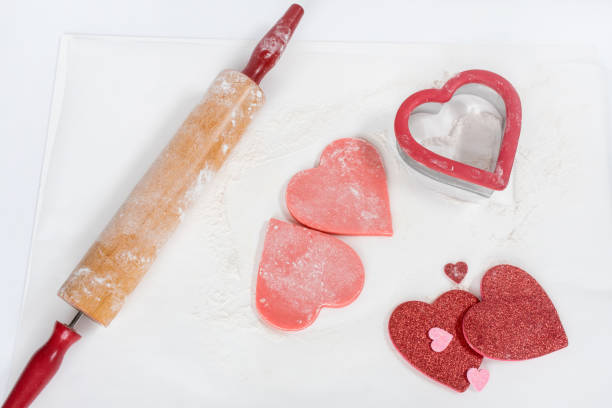 istock Unbaked Pink Cookie Dough Hearts with Accessories 1455985036