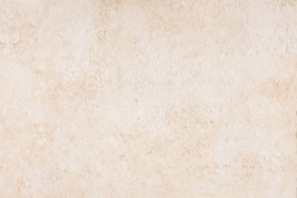 istock Texture of beige porcelain stoneware, ceramic tiles. Abstract background, copy space. 1455985589