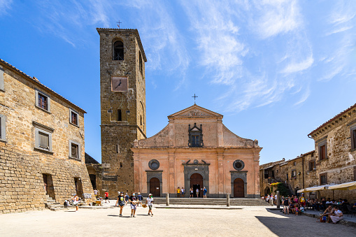 Civita di Bagnoregio, Italy – August 16, 2021: Civita di Bagnoregio, Lazio, Aug. 2021 - Main square in Civita with the Romanesque Church of San Donato