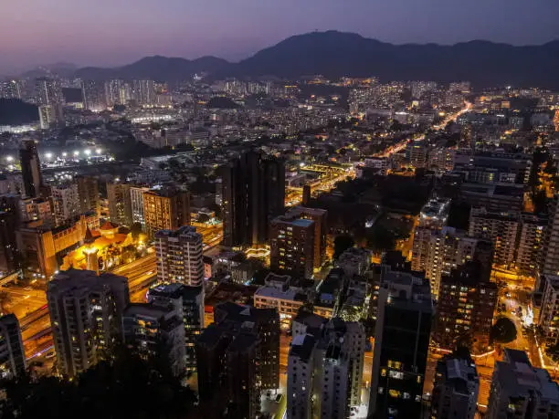 A beautiful drone shot of a Waterloo Road in the nighttime in Hong Kong.