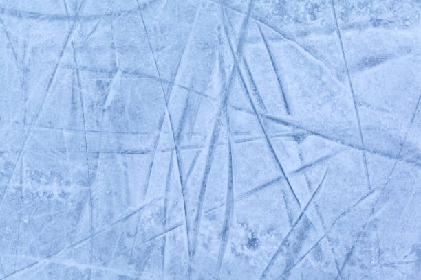 istock Empty ice rink with skate marks after the session outdoor. 1455992247