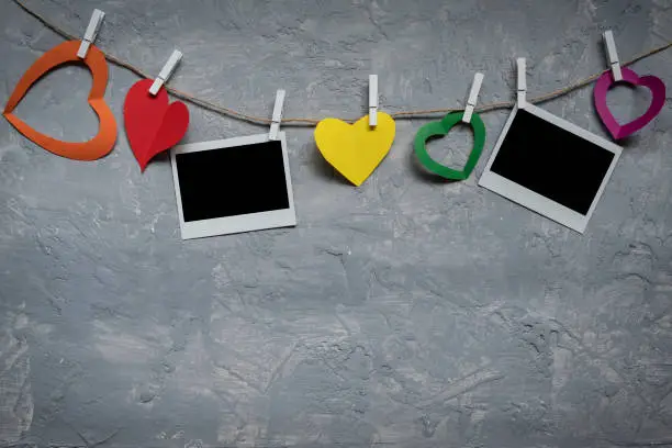 Photo of Polaroids and Heart on Clothesline