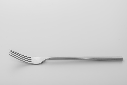 Silver fork isolated on white background.