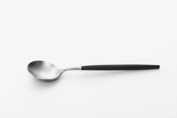 istock Wooden silver spoon isolated on white background. 1455996060