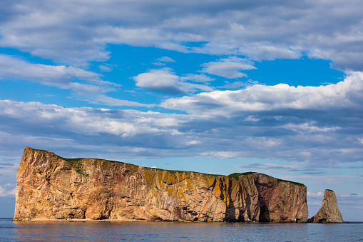 Situated in the town of Percé in Gaspésie Region, the famous Rocher Percé, meaning Pierced Rock, is part of the Gaspé Peninsula.