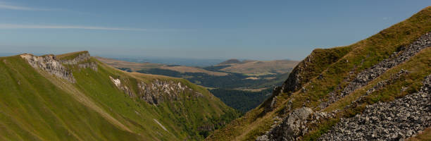 panoramic view of the valley under the sun with a blue sky.