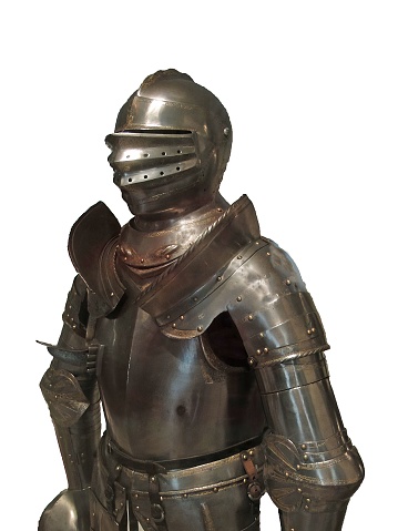 Knight in shiny metal armor on a white background.