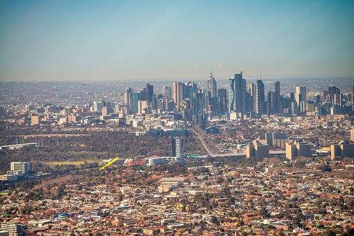 Aerial view of Melbourne skyline from helicopter on a beautiful sunny day, Australia