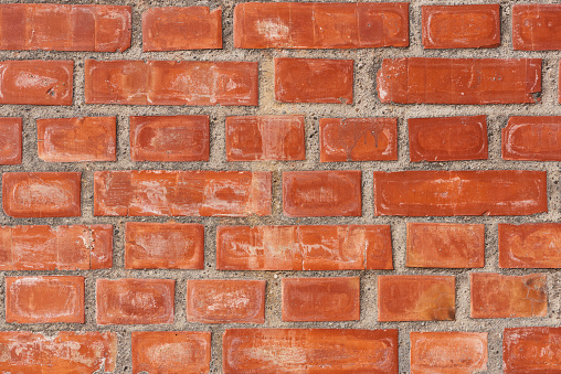 Weathered and Textured Brick wall grunge background. Suitable for interior design.