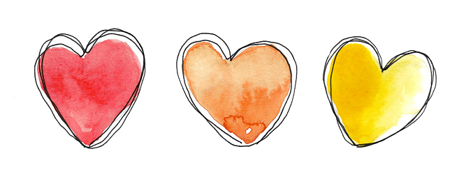 A set of colorful hearts in warm colors. Watercolor illustration by hand on a white background