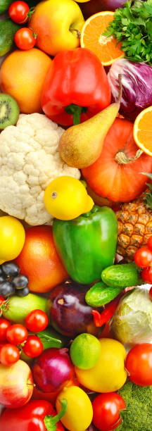 istock Beautiful background of vegetable and fruit. Vertical photo. 1456008156