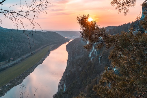 Mesmerizing sunset at the Bastei with view of the Elbe river in Saxonia near Dresden, Germany