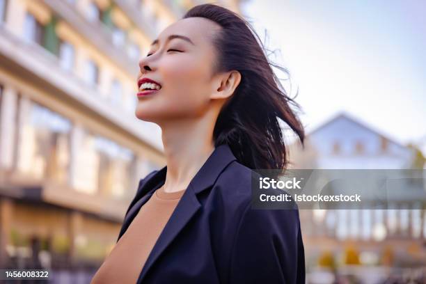 Successful Female Manager Standing On The City Street Stock Photo - Download Image Now