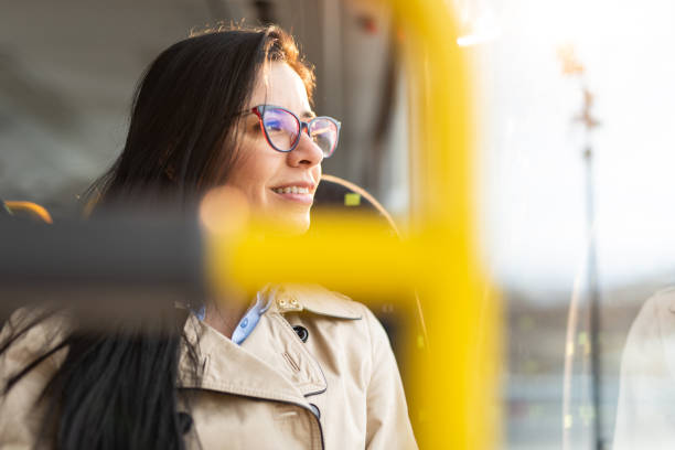 istock Young woman sitting in bus 1456010520