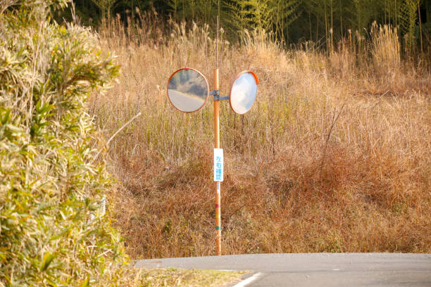 A Japanese curve mirror that helps prevent collisions at a three-way intersection
