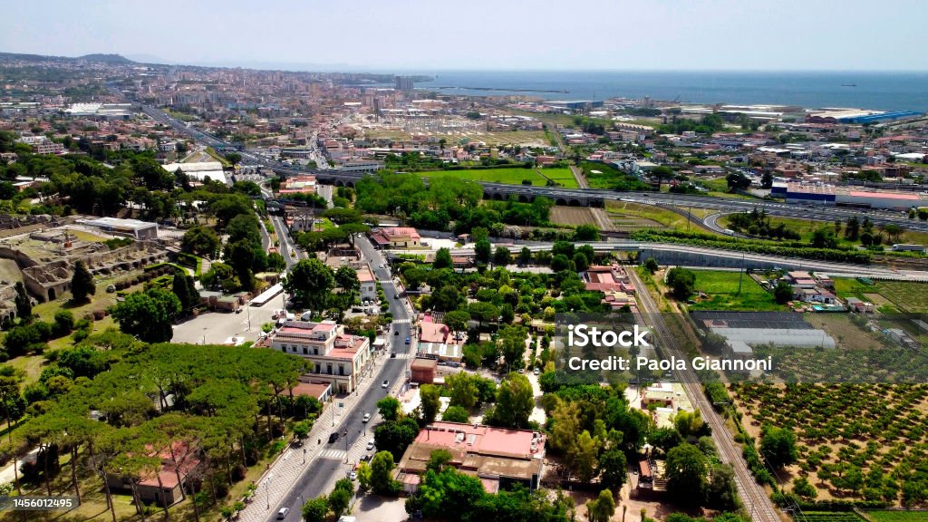 Pompei, Italy. Aerial view of old city from a drone viewpoint in summer season. Pompei, Italy. Aerial view of old city from a drone viewpoint in summer season Aerial View Stock Photo