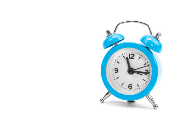 istock Classic retro blue alarm clock on isolated white background 1456013642