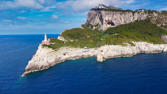 Amazing aerial view of Capri coastline along the lighthouse in summer season