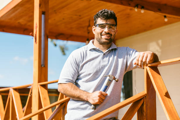 istock Man working on wooden porch 1456018117