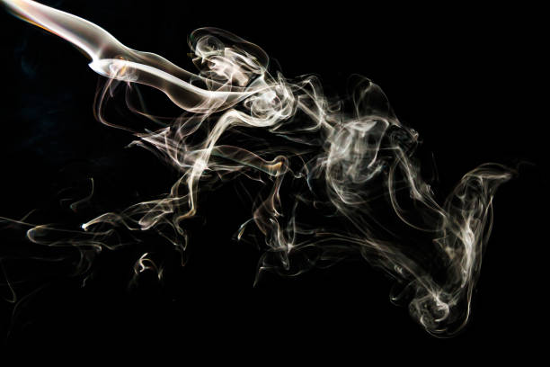 istock Smoke effect texture. Isolated background. Black and dark backdrop. Smokey fire and mistic effect. 1456018515