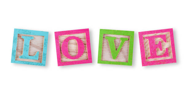istock Love concept with childs wood blocks on white with clipping path 1456021780