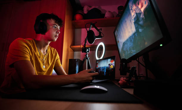 istock Low angle view of a gamer playing in the room 1456023176