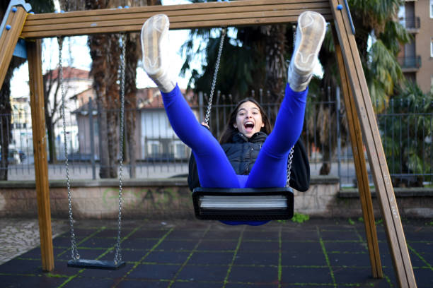 girl swinging