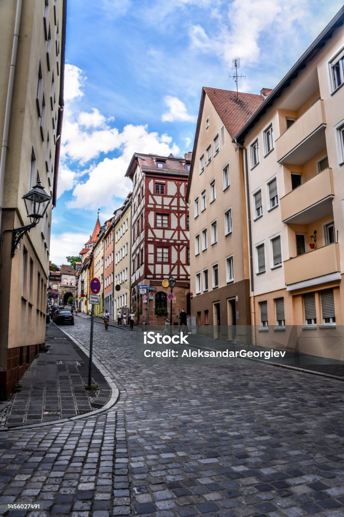 Uphill Street Leading To Neighborhood Of Albrecht Durer House In Nuremberg, Germany Arch - Architectural Feature Stock Photo