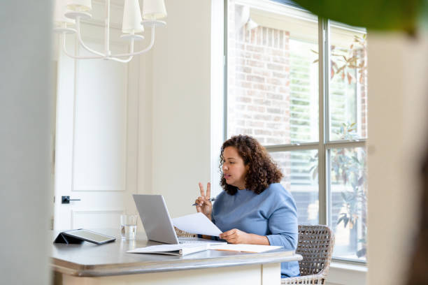 istock Working from home, female consultant gives client advice 1456028798