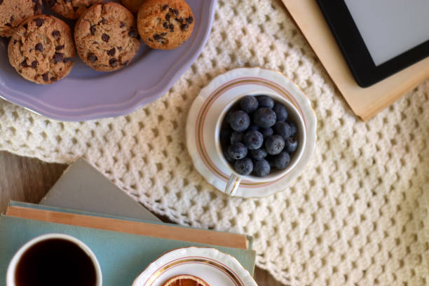 Tea, Books, Tablet, Cookies and Candles