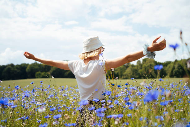 istock Woman embraces summer freedom 1456029507