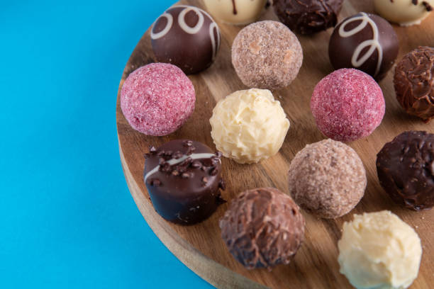 istock photo of chocolates lying on a board 1456033428