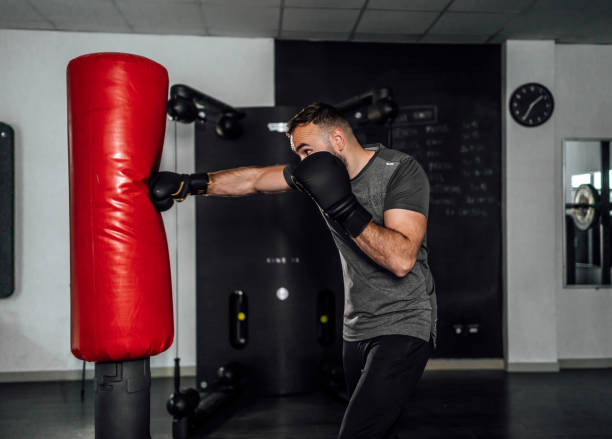 istock Male boxer practicing in the gym 1456035582