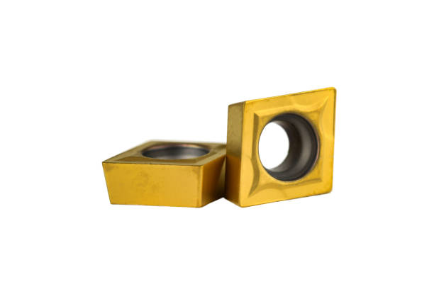Carbide insert cutting tool, macro Carbide insert cutting tool, macro isolated on white in synch stock pictures, royalty-free photos & images