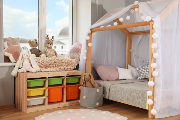 istock Stylish child room interior with comfortable house bed 1456038275