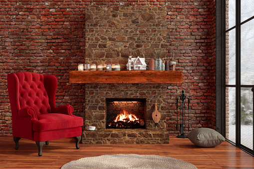 Chalet Interior With Fireplace, Red Armchair And Snow View Through Window