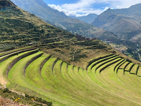 Peru Urubamba Sacred Valley Inca green terraces and Andes mountains range beautiful landscape.