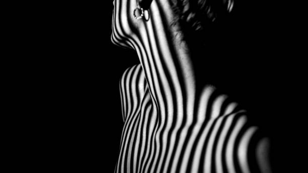 istock Female body in stripes 1456042514