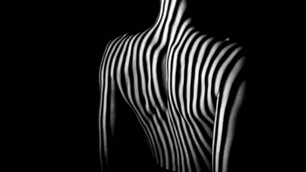 istock Female body in stripes 1456042544